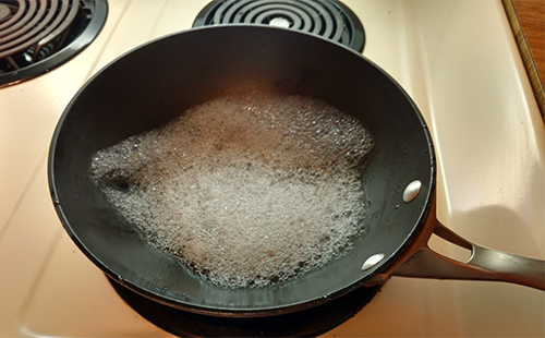 Soap bubbles in a frying pan